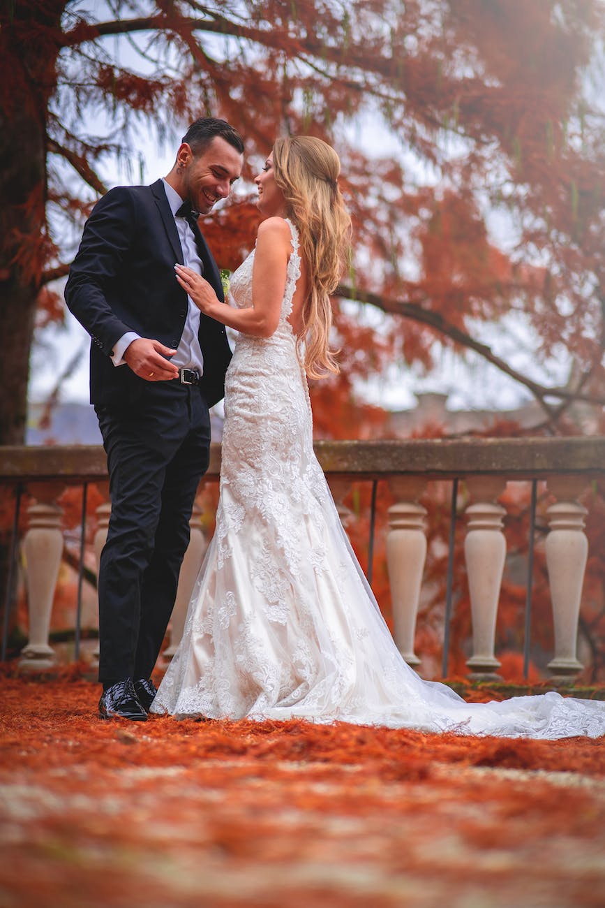 a couple in their wedding clothes